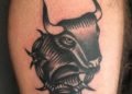 Bold Taurus Tattoo For Men of Bulls Head on Leg