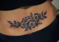 Flower Lower Back Tattoo Design For Women