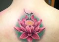 Gemini Tattoo Design For Women of Lotus Flower on Back