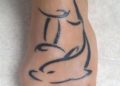 Gemini Tattoo Design For Women on Feet of Dolphin