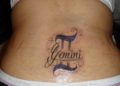 Gemini Tattoo Design Number and Writing For Women on Lower Back
