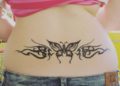 Lower Back Tattoo Design Ideas of Butterfly and Tribal For Girl