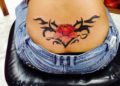 Lower Back Tattoo Design Ideas of Red Flower For Women