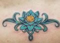Lower Back Tattoo Design of Blue and Yellow Flower