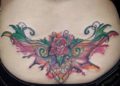 Lower Back Tattoo Ideas of Flower For Women