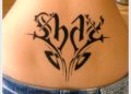 Lower Back Tattoos Design of Calligraphy For Women