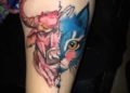 Red and Blue Taurus Tattoo Design For Women