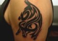 Taurus Tattoo For Men of Tribal Bulls on Upper Arm