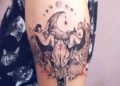 Taurus Tattoo For Women on Upper Arm of Skull, Flower and Moon