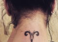 Tribal Aries Tattoo For Females on Neck
