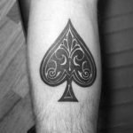 ace of spades tattoo forearm