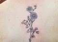 Aster Flower Tattoo on Back For Girl