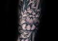 Black Chrysanthemum Tattoo Design on Upper Arm