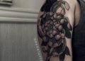 Black Chrysanthemum Tattoo on Upper Arm For Girl