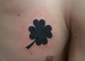 Black Four Leaf Clover Tattoo Design on Chest