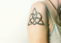 Celtic Knot Tattoo Design on Upper Hand For Girl