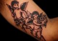 Couple Cupid Tattoo Traditional on Biceps