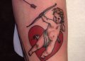 Cupid Tattoo Ideas with Red Heart