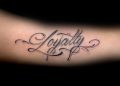 Loyalty Tattoo Writing on Arm