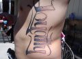 Loyalty Tattoo Writing on Rib