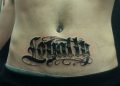 Loyalty Tattoo Writing on Stomach