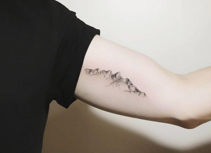 Pikes Peak Tattoo Designs on Ribs, Hand and Shoulder - Visual Arts Ideas