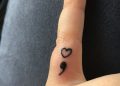 Small Semicolon Tattoo on Finger