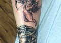 Traditional Cupid Tattoo Design on Leg